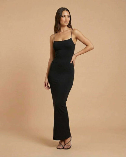 Calypso Maxi Dress by SLIMONA - Minimal black backless maxi dress with spaghetti straps.
