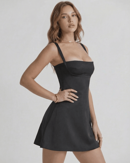Cannes Mini Dress by Lauven, showcasing a sleek A-Line silhouette with structured bust in elegant black.