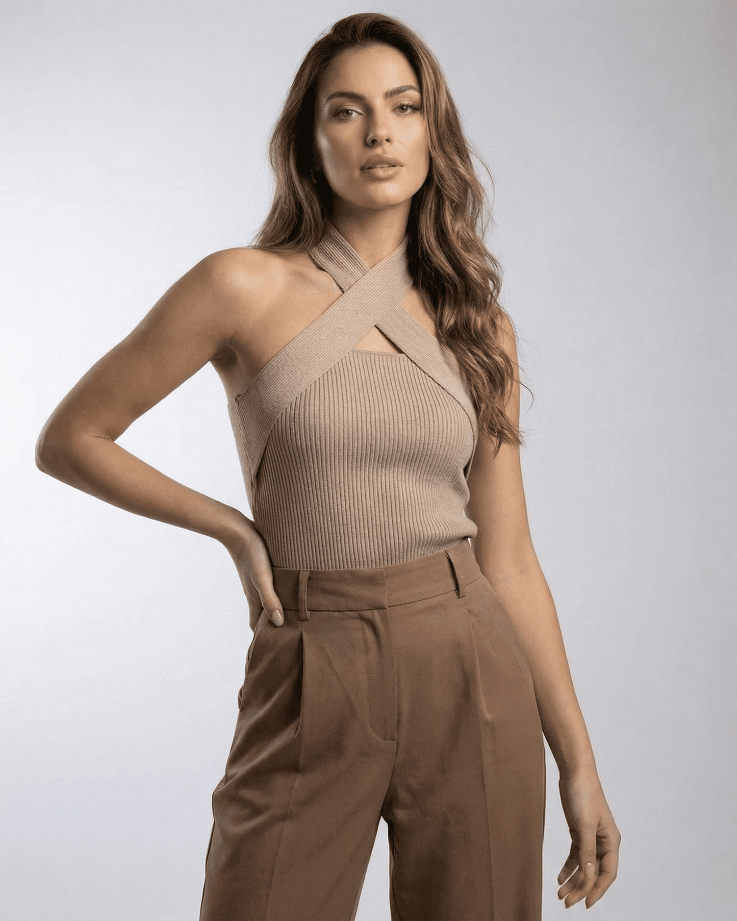 Capri Top by SLIMONA, a ribbed halter knit top with an elegant design and streamlined silhouette.