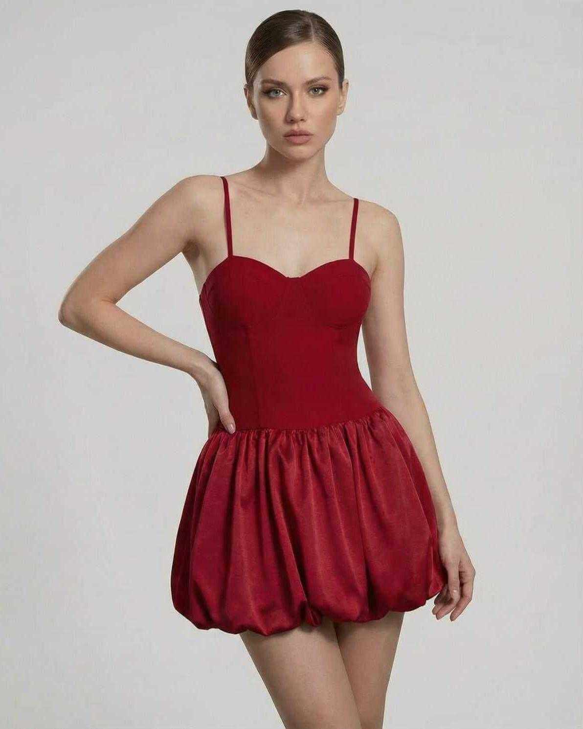Carmine Mini Dress by Lauven featuring a sculpted bodice and puff skirt, showcasing modern elegance and refined design.