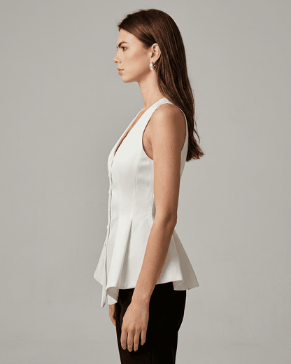 Celeste Blouse by SLIMONA, an elegant satin tailored sleeveless V-neck blouse in white, showcasing a refined silhouette.
