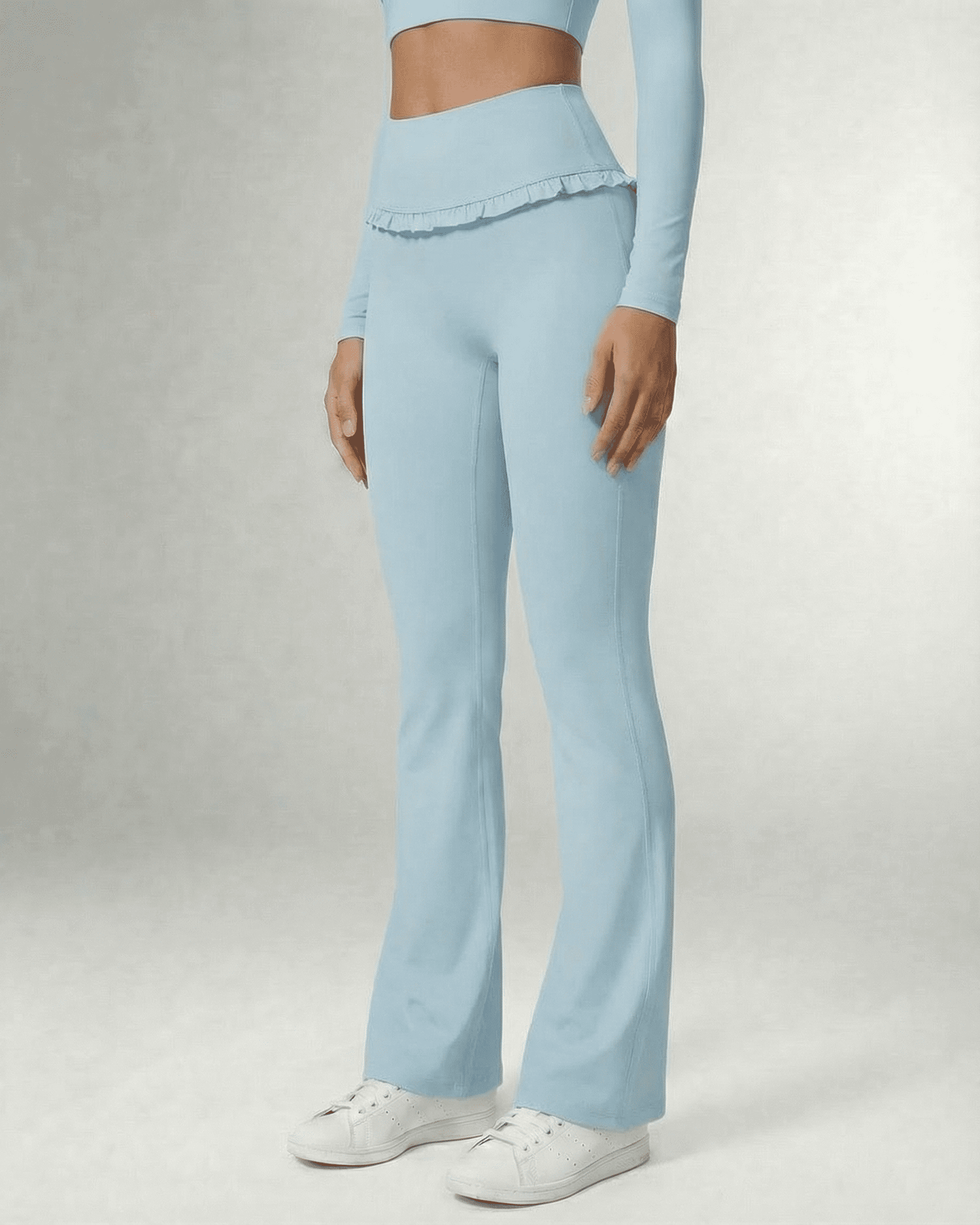 Celeste Leggings Blue by SLIMONA, stylish light blue flare pants with pockets for comfort and elegance.