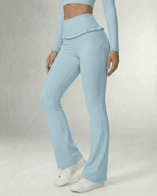 Celeste Leggings Blue by SLIMONA - Stylish light blue flare pants with pockets for comfort and elegance.