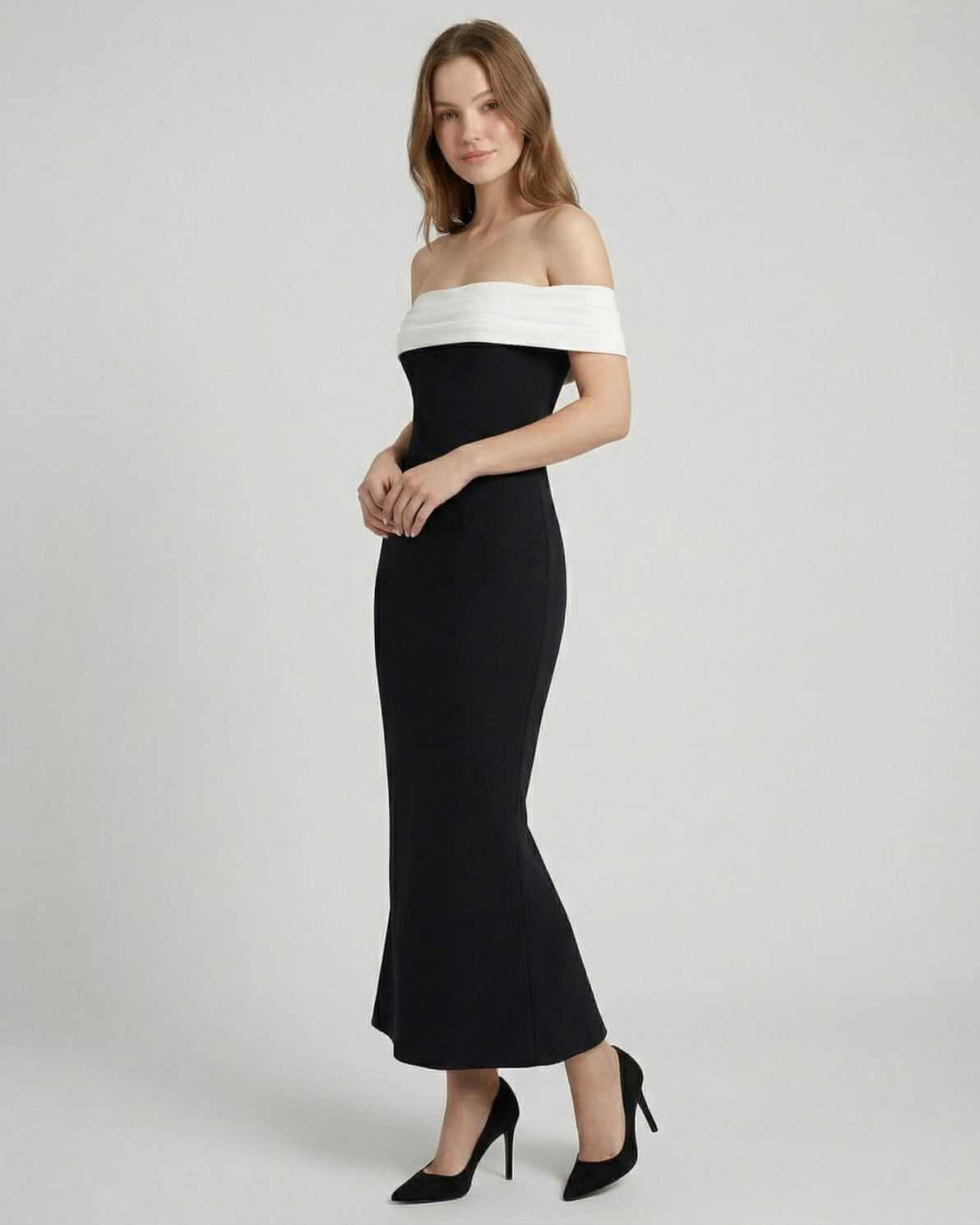 Celeste Maxi Dress by Lauven, elegant off-shoulder black dress with white neckline and flattering A-line silhouette.