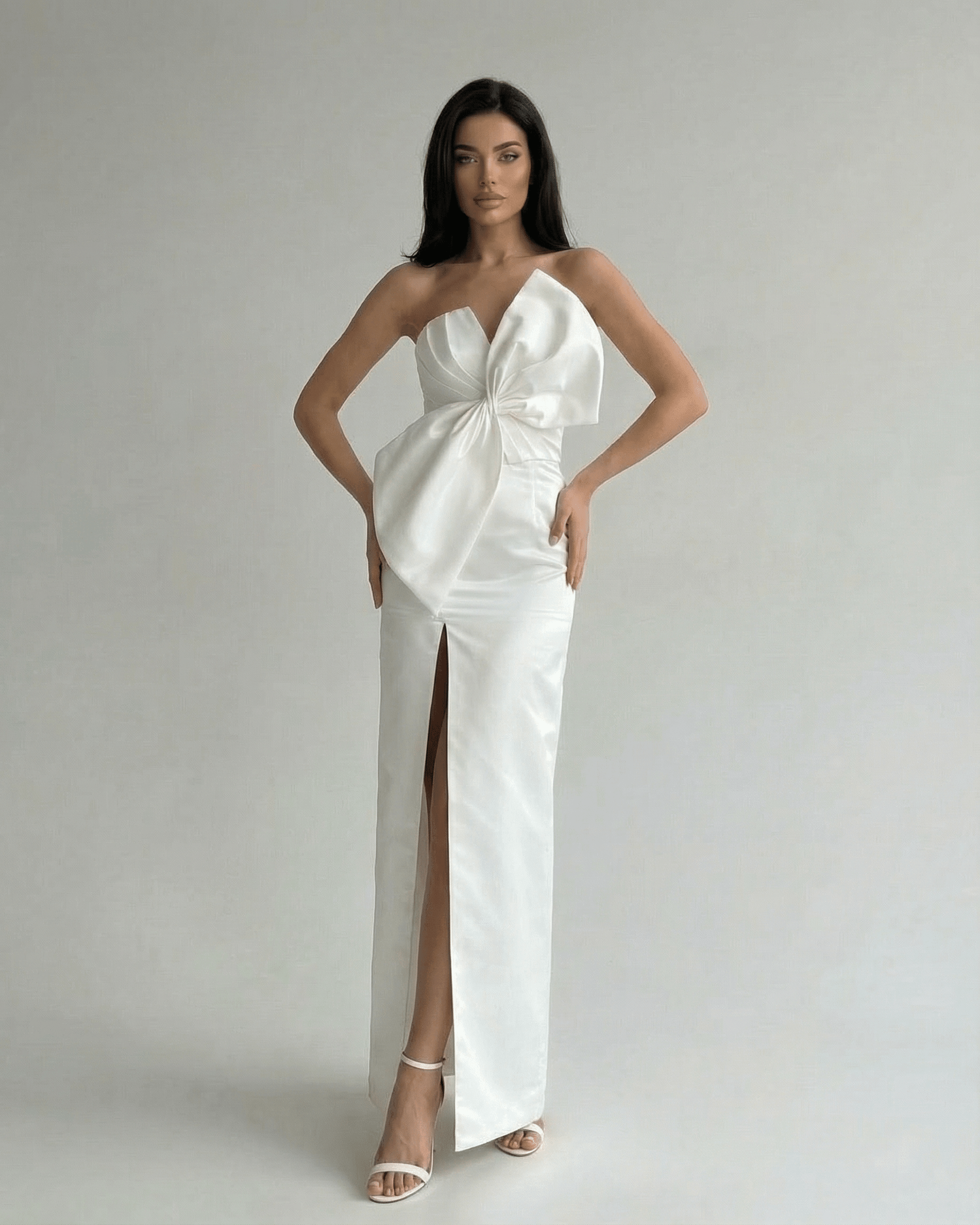 Celeste Maxi Dress by Lauven - elegant white strapless satin gown with front slit and sculpted silhouette.