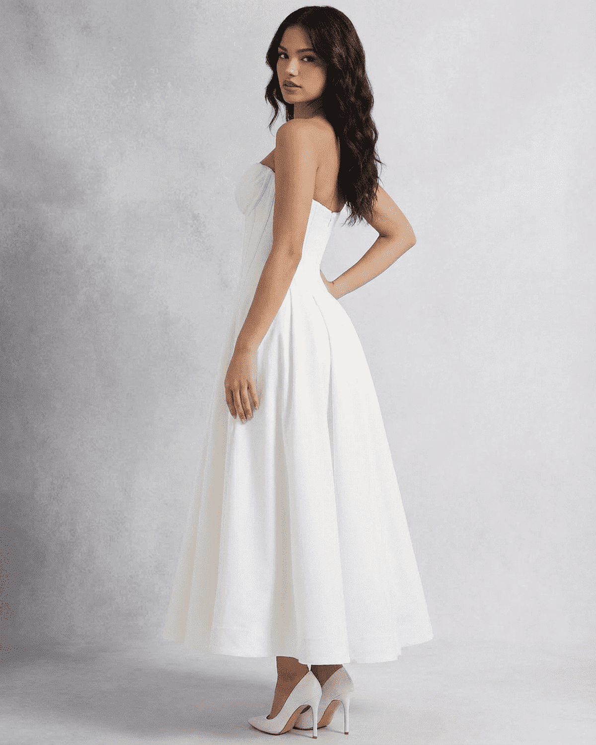 Celeste Midi Dress by SLIMONA - Elegant strapless A-line dress showcasing a beautiful silhouette and luxurious design.