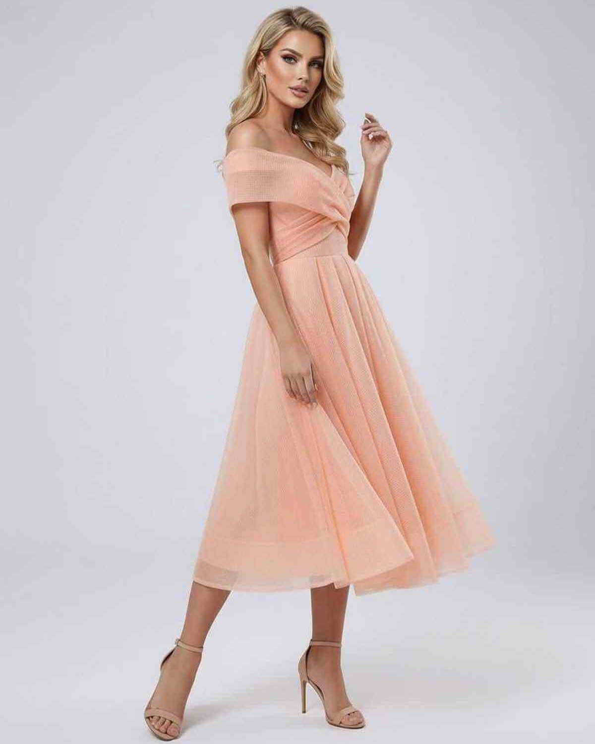 Celeste Midi Dress by Lauven, an elegant off shoulder dress in soft peach, ideal for special occasions.