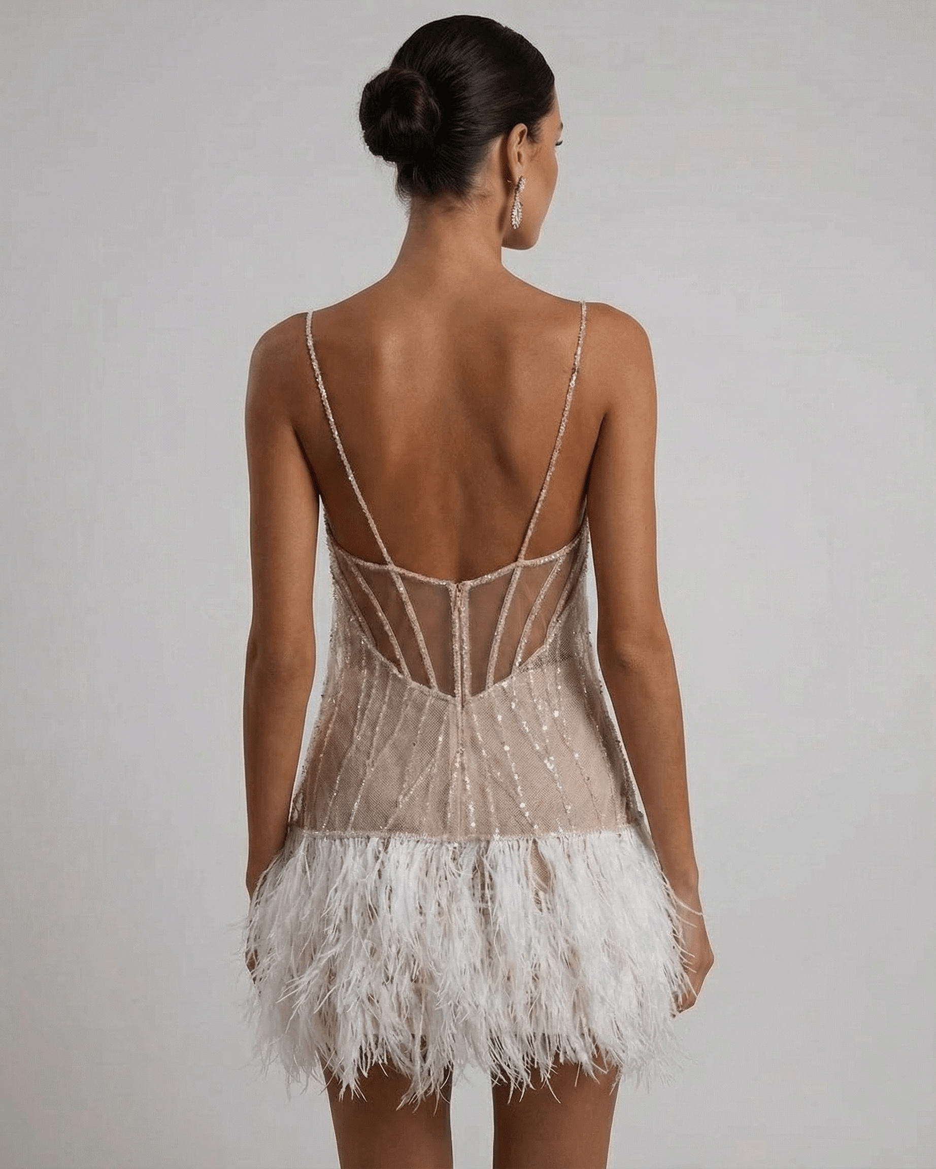 Celeste Mini Dress by SLIMONA, featuring sequin tulle and feather tassel hem for a fairycore look.