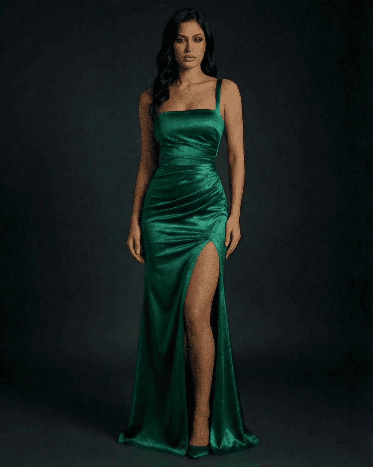 Celestine Maxi Dress by SLIMONA in luxurious emerald green satin with a high slit design.