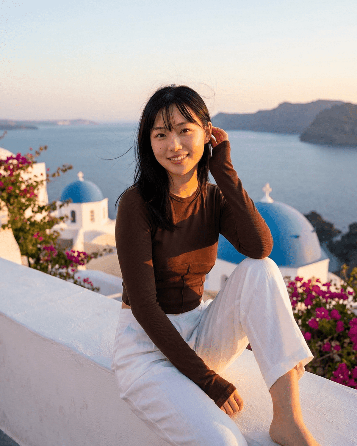 A woman wearing a Cocoa Corset Top against a scenic backdrop, showcasing the stylish design of the SLIMONA brand.