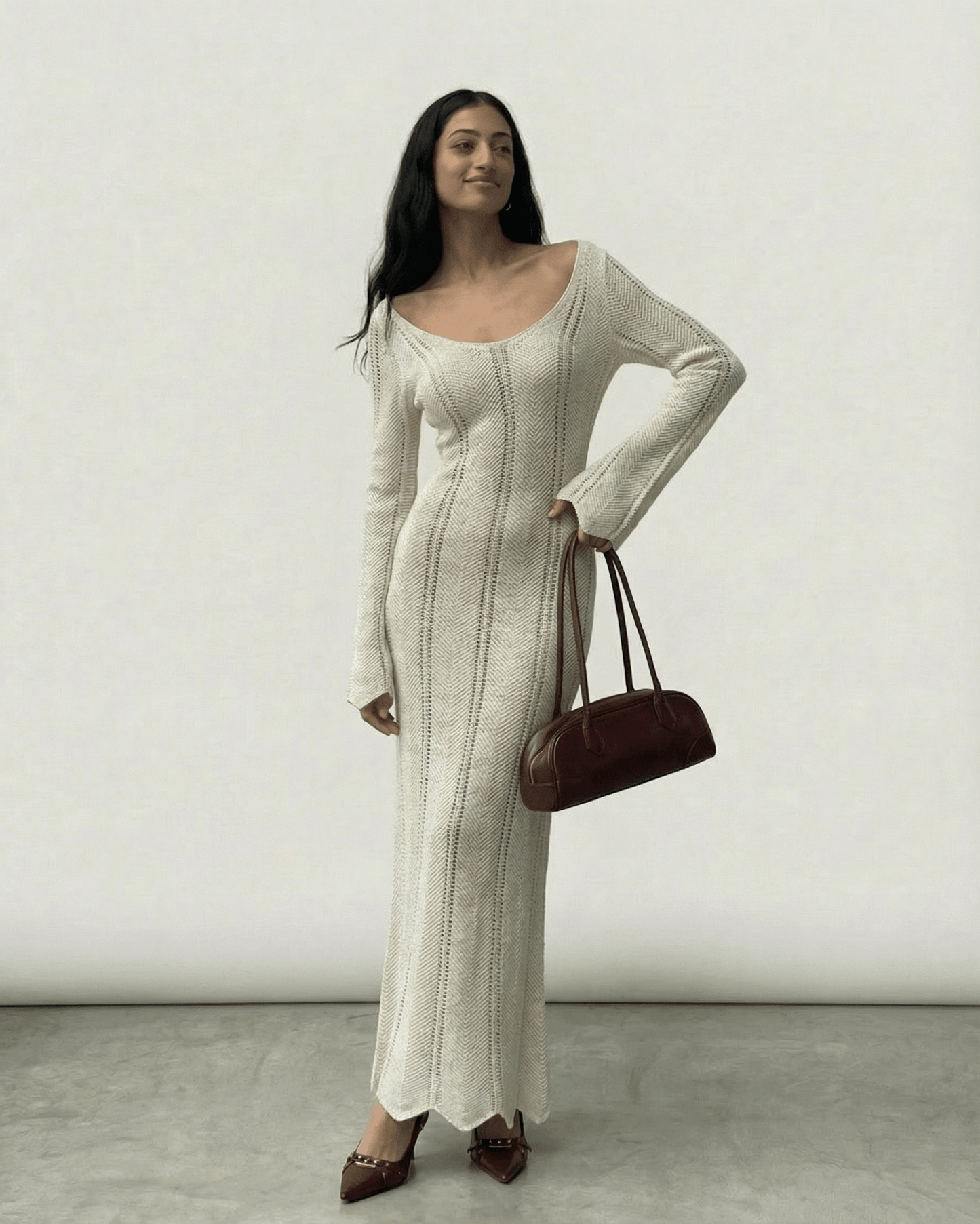 Elara Maxi Dress by Lauven featuring a ribbed V-neck bodycon silhouette with long flare sleeves.