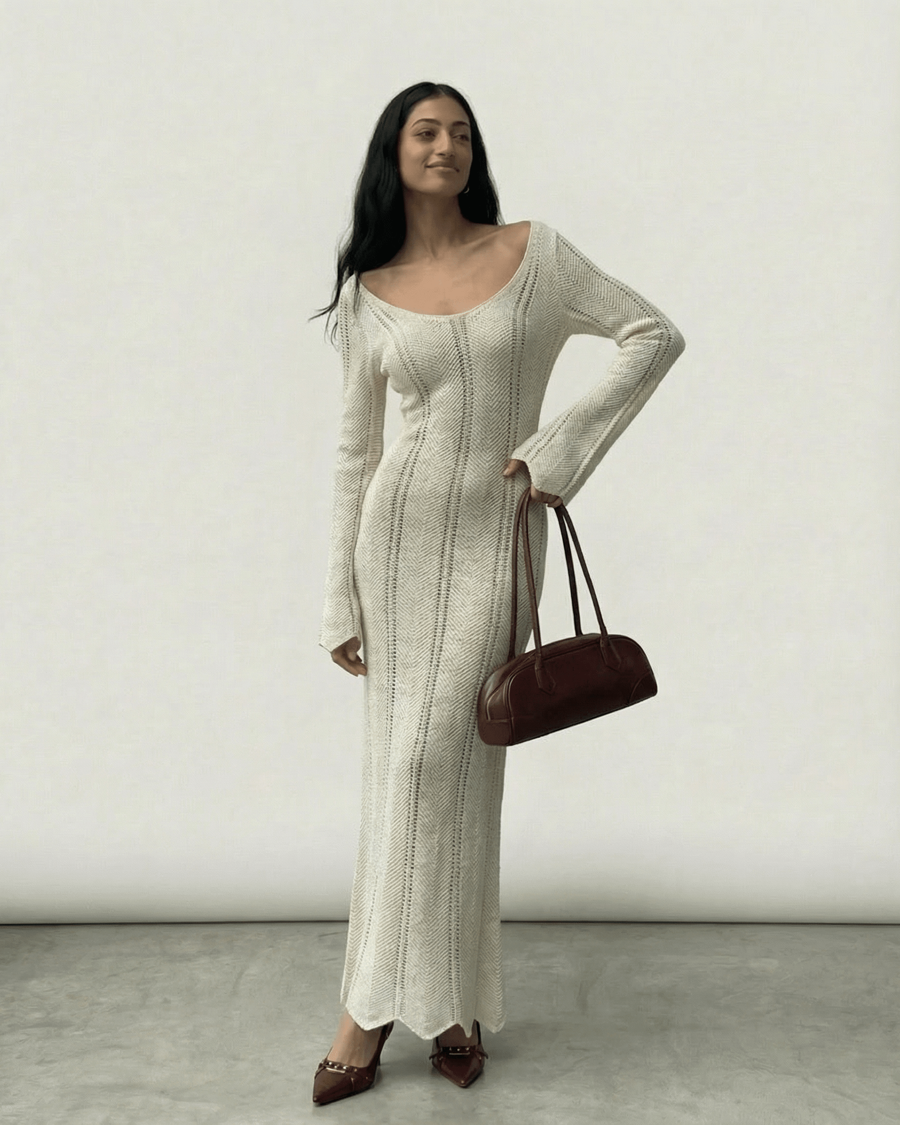 Elara Maxi Dress by Lauven featuring a ribbed V-neck bodycon silhouette with long flare sleeves.