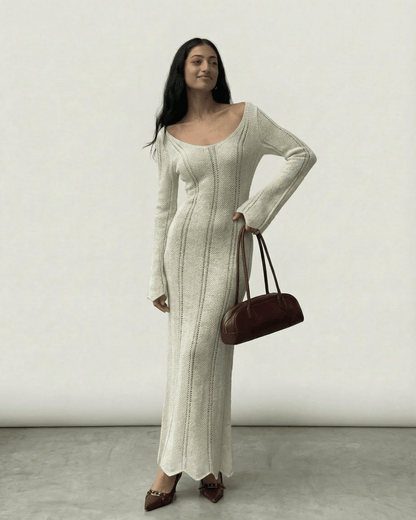 Elara Maxi Dress by Lauven featuring a ribbed V-neck bodycon silhouette with long flare sleeves.