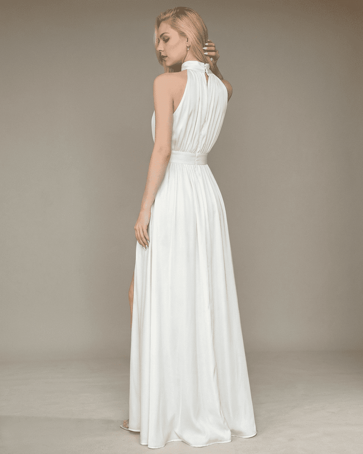 Elegant back view of the Elara Maxi Dress by SLIMONA, showcasing sleeveless turtleneck design and side slit.