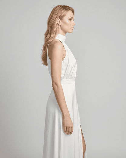 Elara Maxi Dress by SLIMONA, sleeveless turtleneck design in white, featuring high waist and side slit.