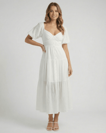 Elara Midi Dress by Lauven, elegant white A-line silhouette with puff sleeves, perfect for modern femininity.