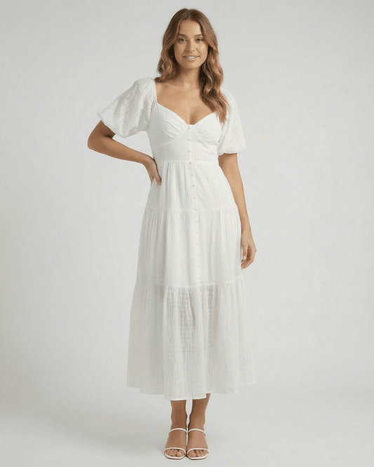 Elara Midi Dress by Lauven, elegant white A-line silhouette with puff sleeves, perfect for modern femininity.