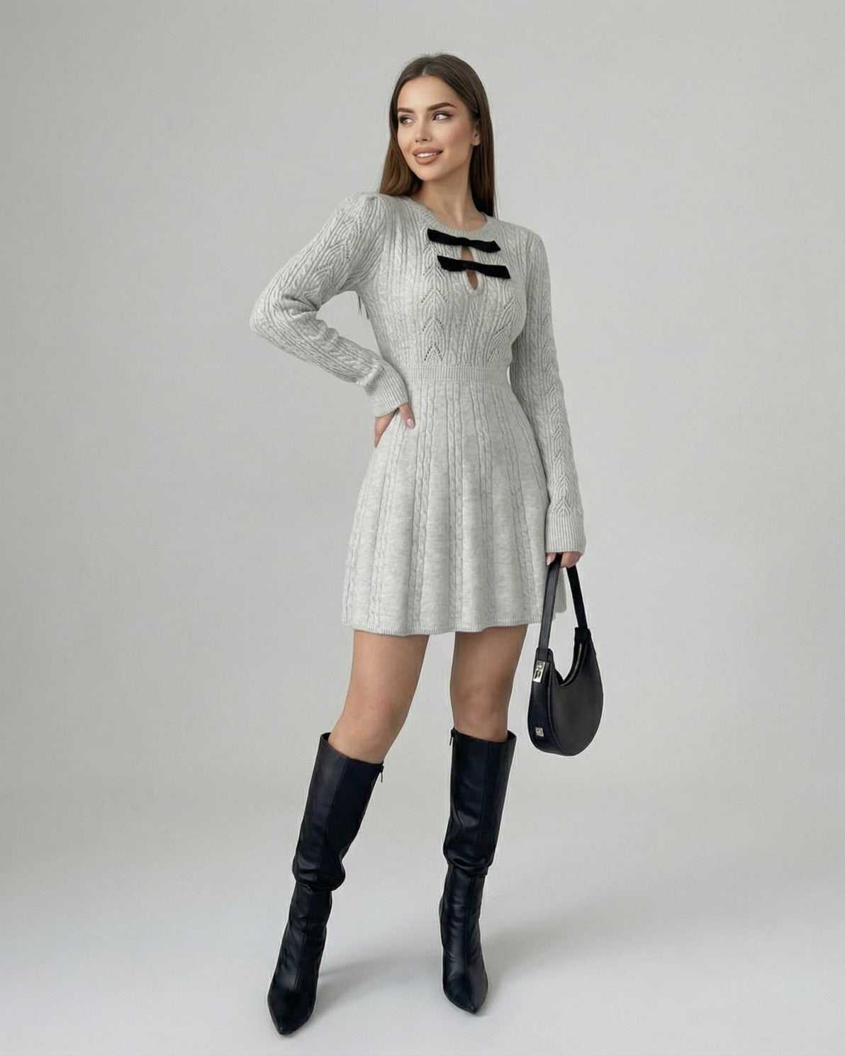 Elara Mini Dress by Lauven - Long Sleeve Knit Mini Dress with Bow Detail, featuring a polished silhouette and textured finish.