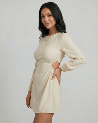 Elara Mini Dress by Lauven featuring a long sleeve A-line silhouette with cut-out detail, perfect for autumn and winter styling.