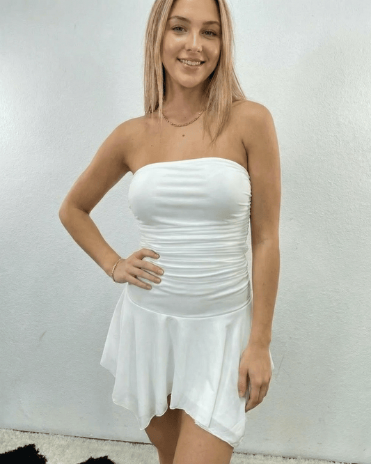 Elara Mini Dress - Lauven Brand, strapless white mini dress with ruched bodice and flowy hem.