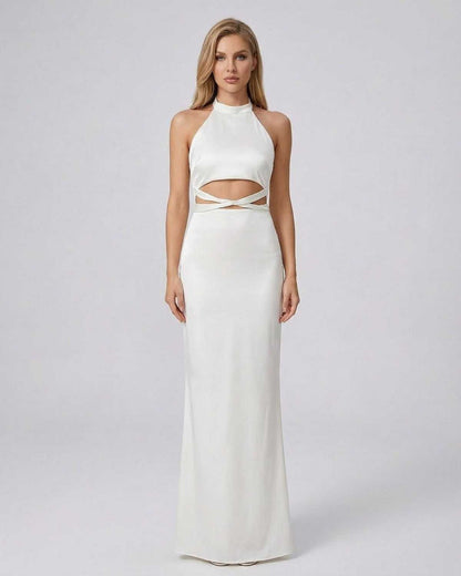 Elysia Maxi Dress by SLIMONA in solid white with a halter neck and modern cutout waist detail.