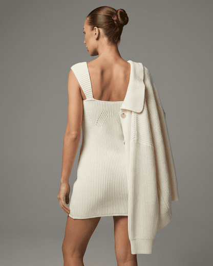 Elysia Mini Dress by SLIMONA in soft knit with a fitted bodycon style, showcasing a modern high-waist silhouette.
