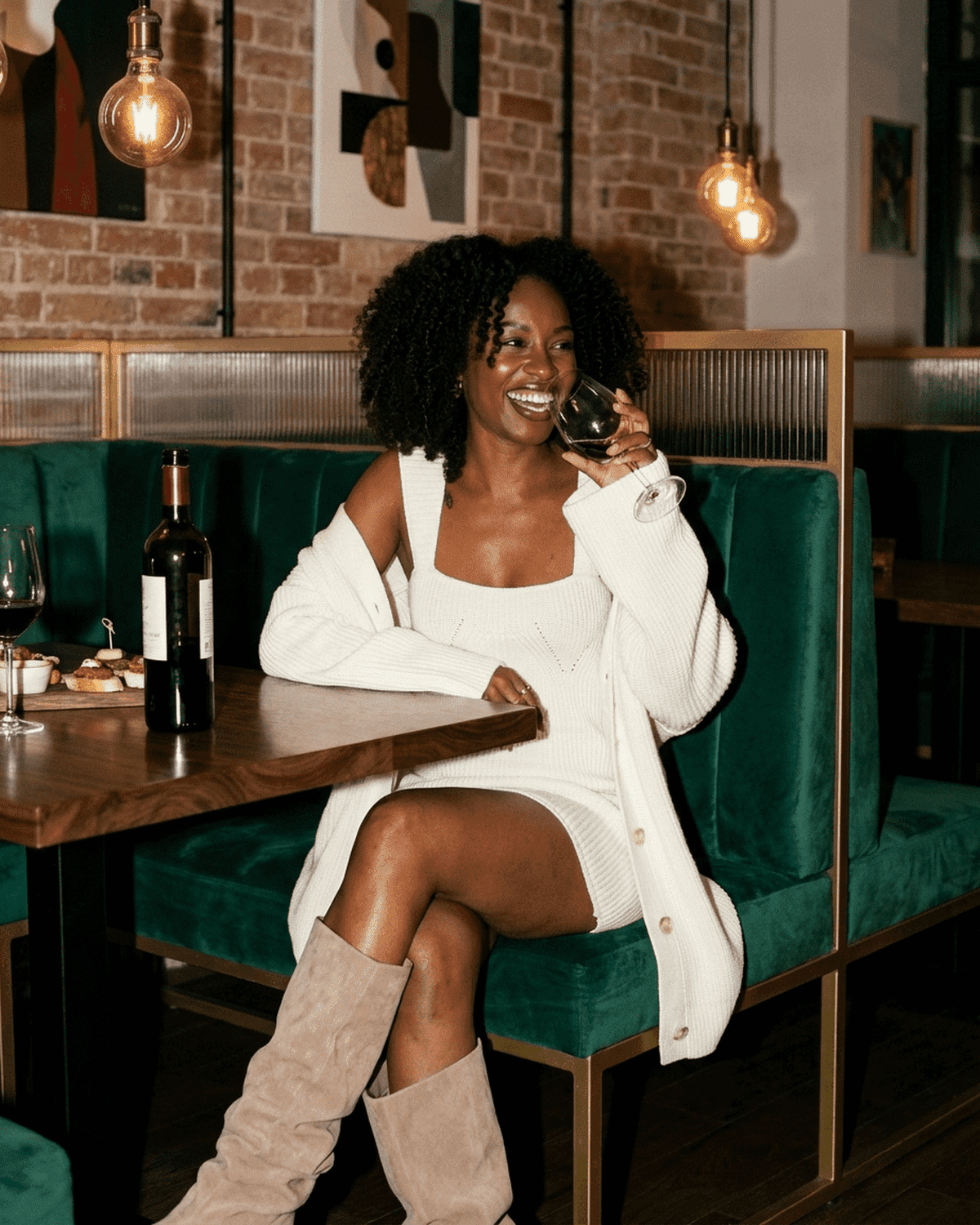 Elysia Mini Dress by SLIMONA modeled in a chic setting, showcasing a stylish fitted silhouette and elegant look.