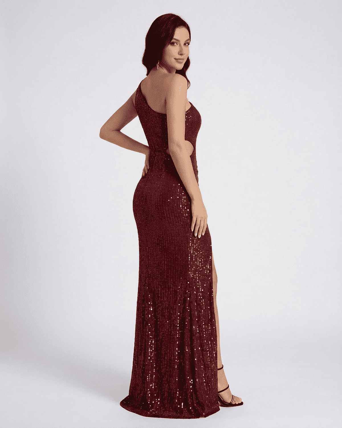 Ember Maxi Dress by SLIMONA, one-shoulder sequin split dress showcasing a thigh-high slit and modern silhouette.