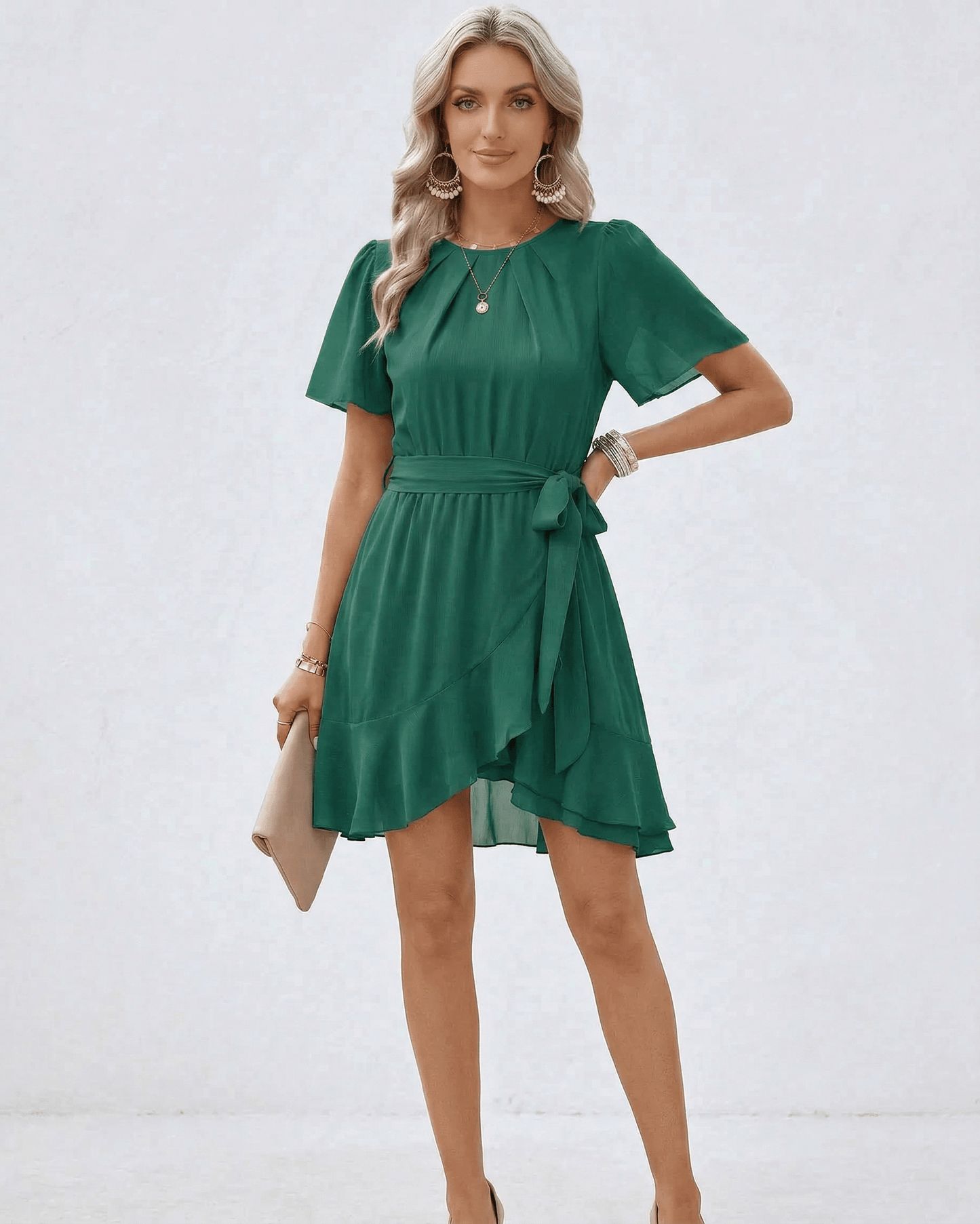Emerald Ruffle Dress by Lauven featuring waist tie and flutter sleeves for a feminine look.