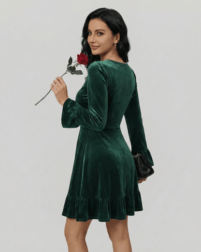 Emeraldia Mini Dress by Lauven, long sleeve, A-line silhouette in deep green with velvety texture.