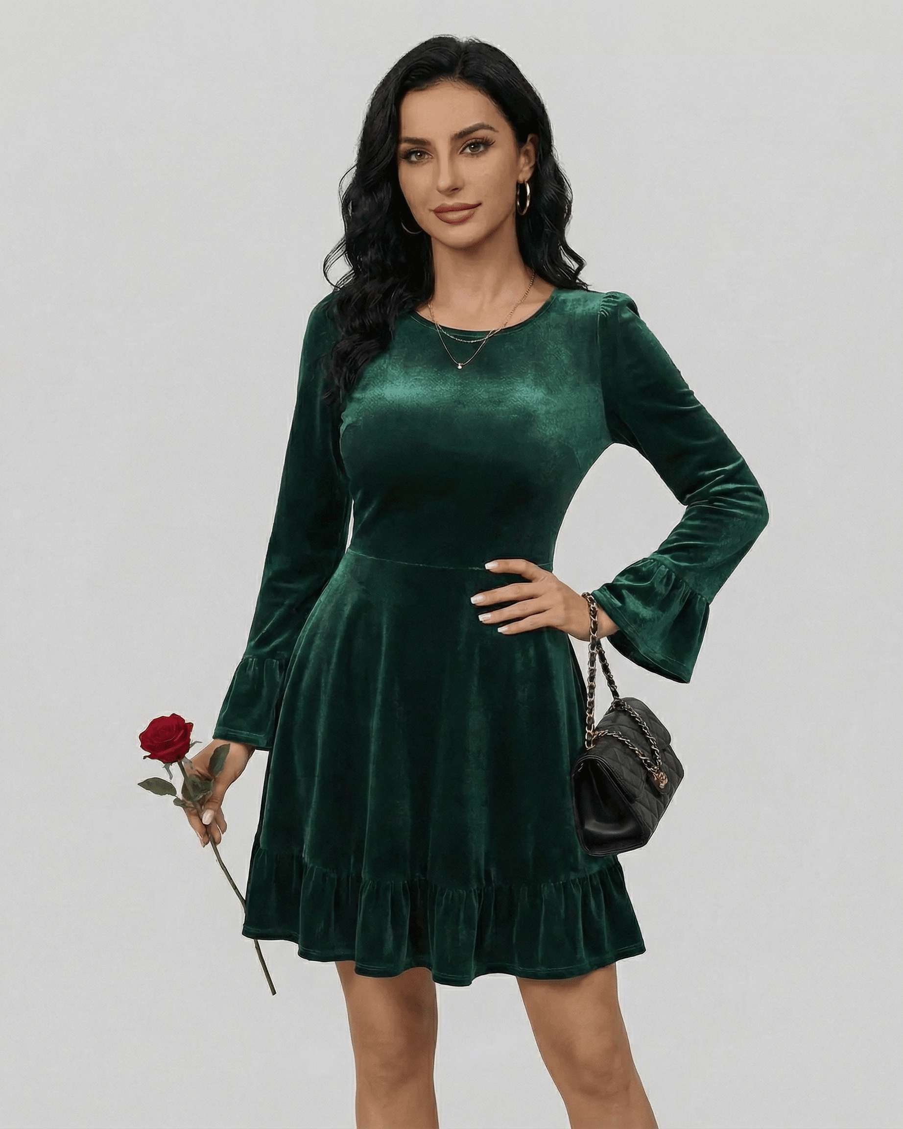 Emeraldia Mini Dress by Lauven, featuring long sleeves, A-line silhouette, and deep green velvet fabric.