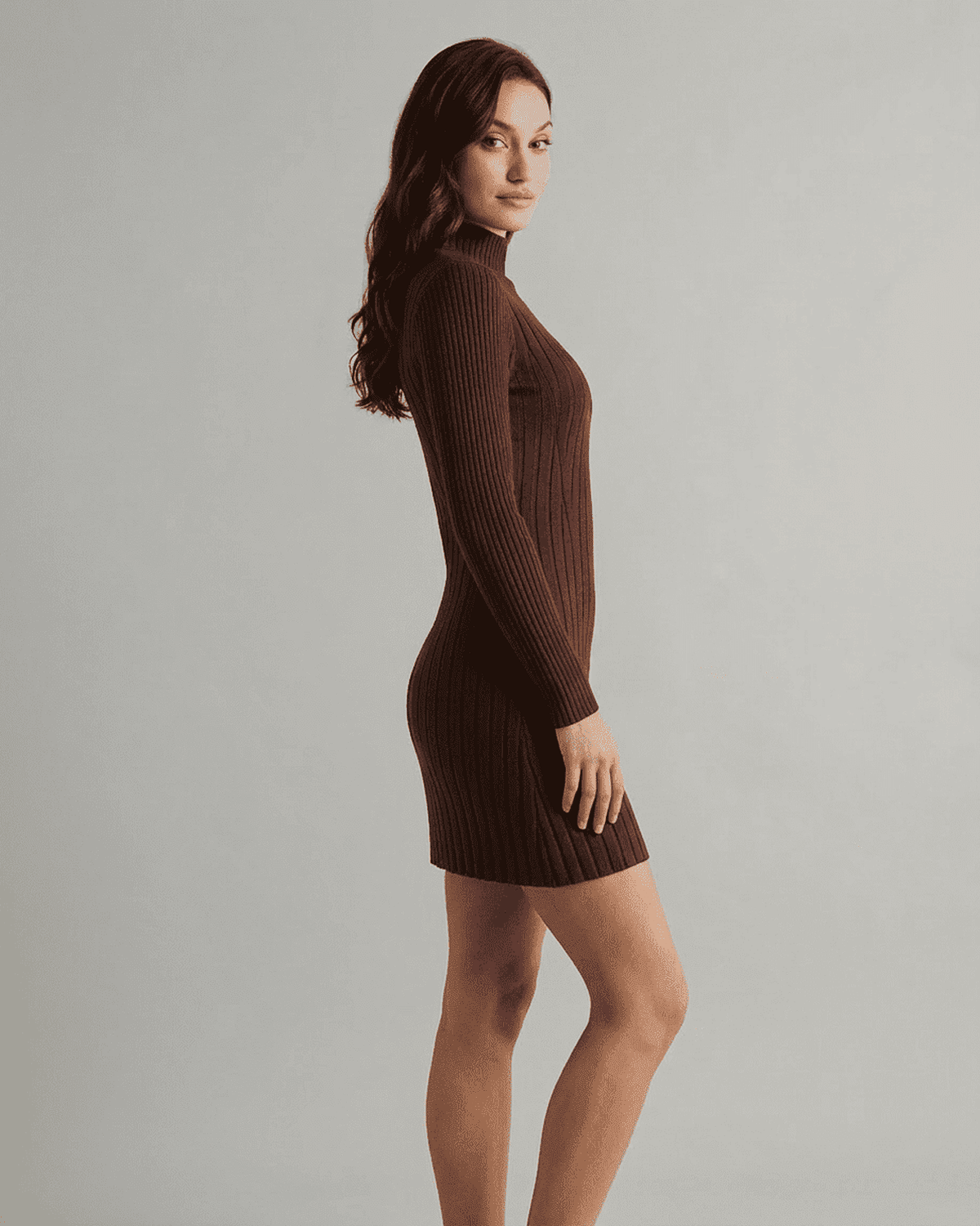 SLIMONA Florence Mini Dress in ribbed knit with mock neck and long sleeves, showcasing a chic A-line silhouette.