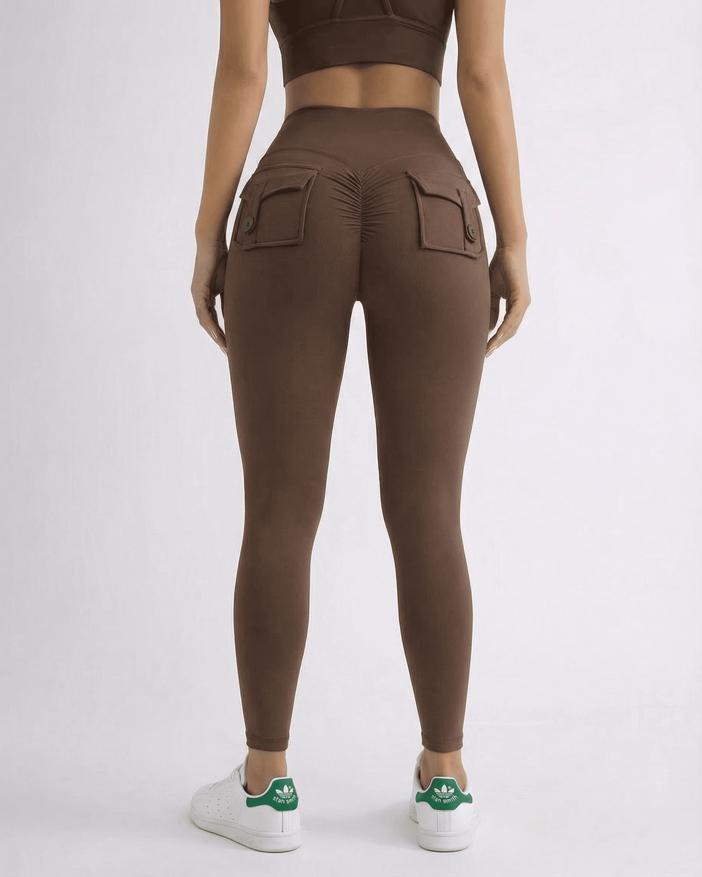 Hazel Leggings by SLIMONA, sleek brown high-waist leggings with pocket details, perfect for workouts and casual wear.