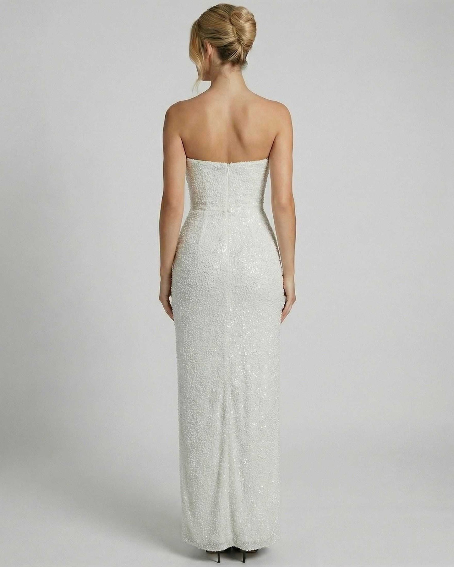 Celeste Maxi Dress by SLIMONA, showcasing the back design with elegant embellishments and a strapless bandeau silhouette.