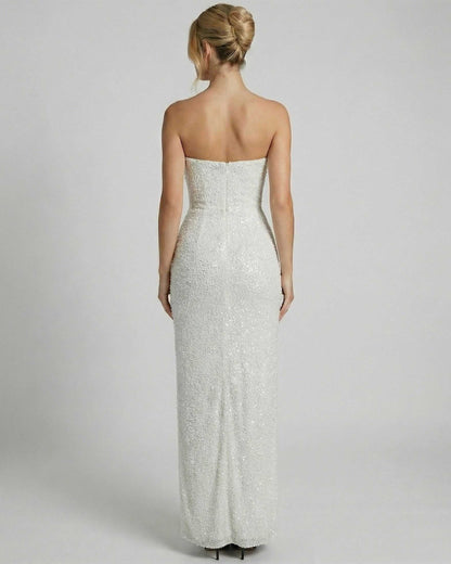 Celeste Maxi Dress by SLIMONA, showcasing the back design with elegant embellishments and a strapless bandeau silhouette.