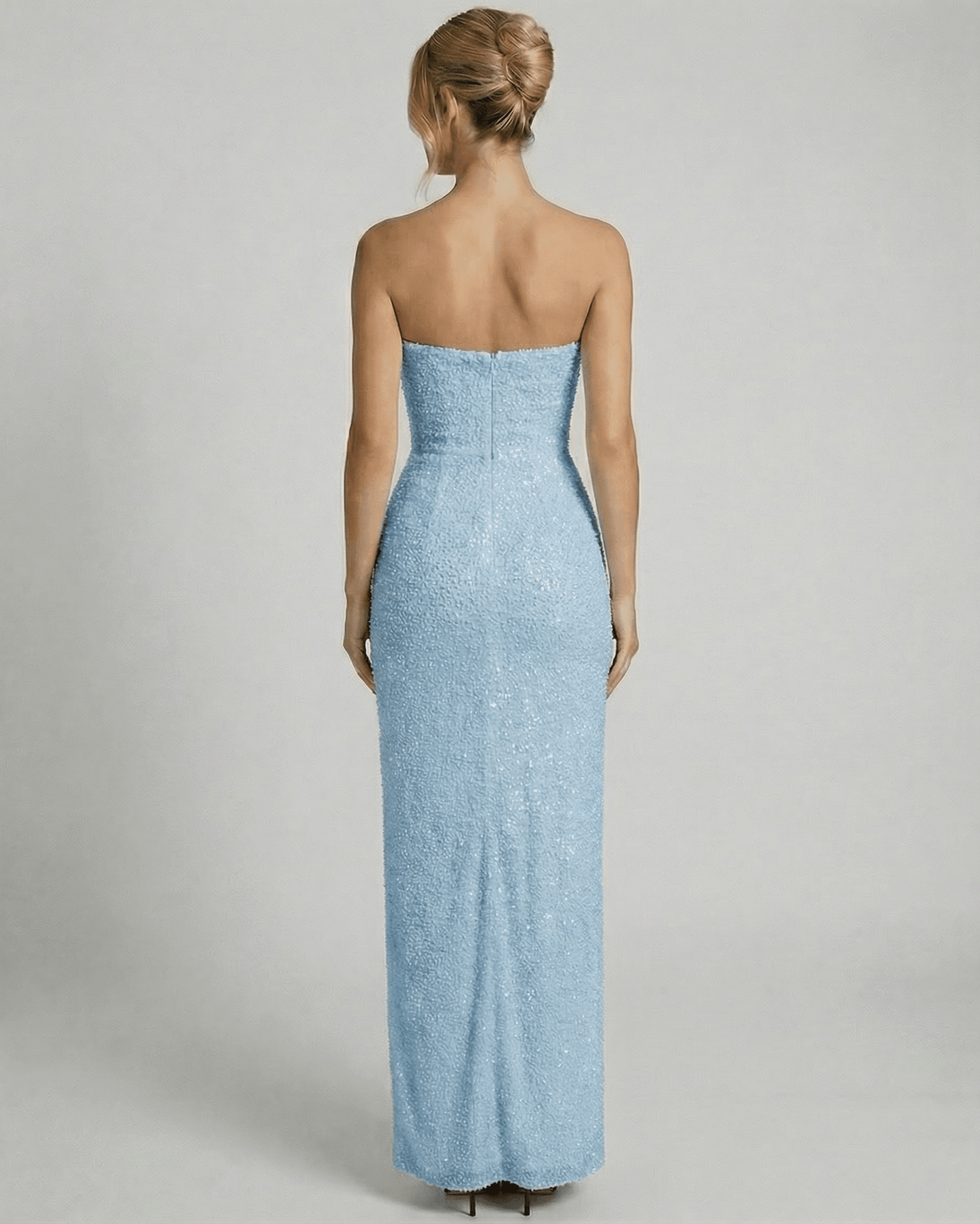 Azurea Maxi Dress by SLIMONA, view from the back showcasing the embellished bandeau design in light blue.