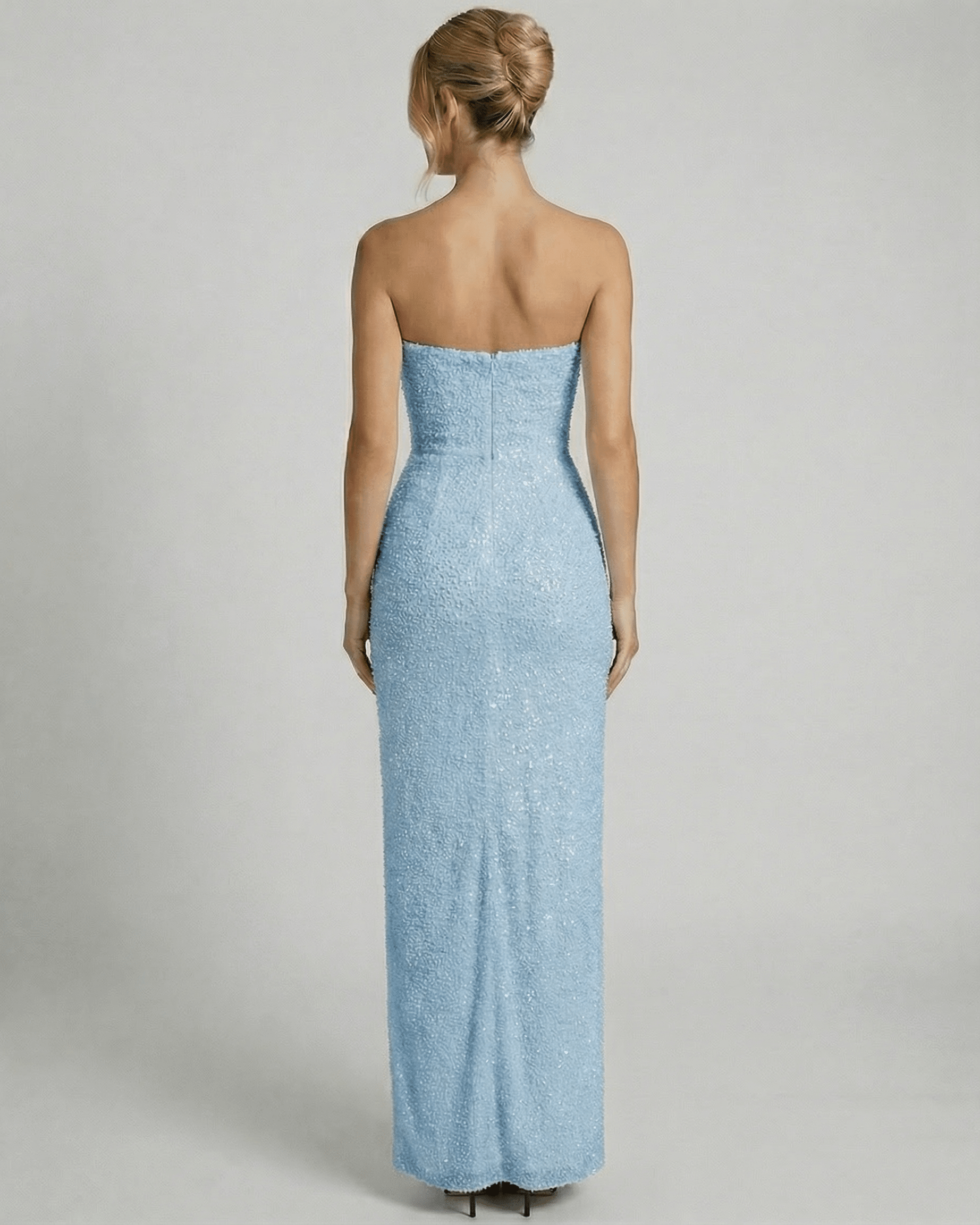 Azurea Maxi Dress by SLIMONA, view from the back showcasing the embellished bandeau design in light blue.