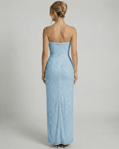 Azurea Maxi Dress by SLIMONA, view from the back showcasing the embellished bandeau design in light blue.