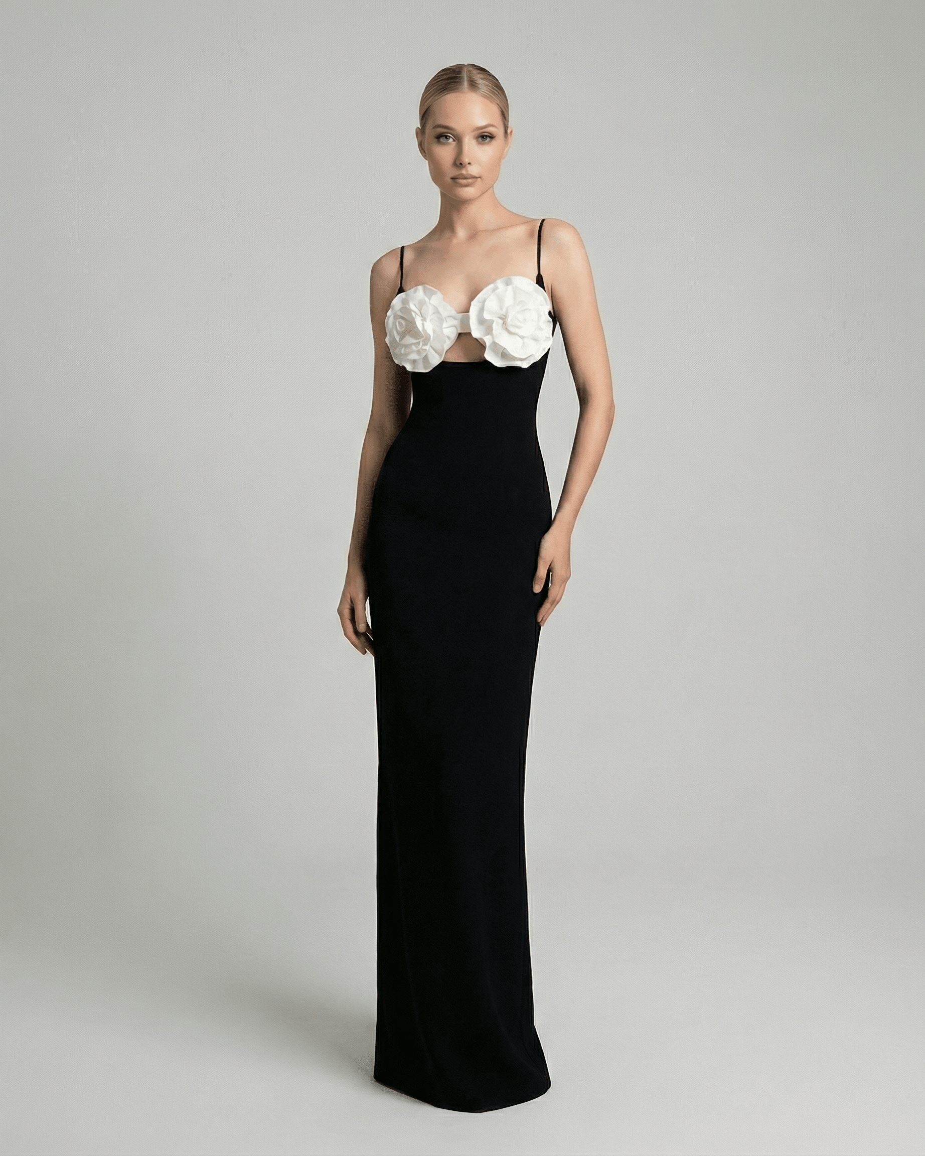 Celeste Maxi Dress by Lauven featuring floral embellished bust and sleek silhouette in black knit fabric.