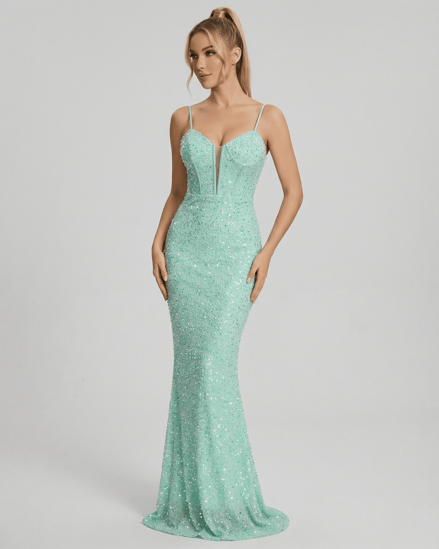 Celeste Maxi Dress by Lauven - Elegant green sequin fitted mermaid gown with spaghetti straps and V neckline.