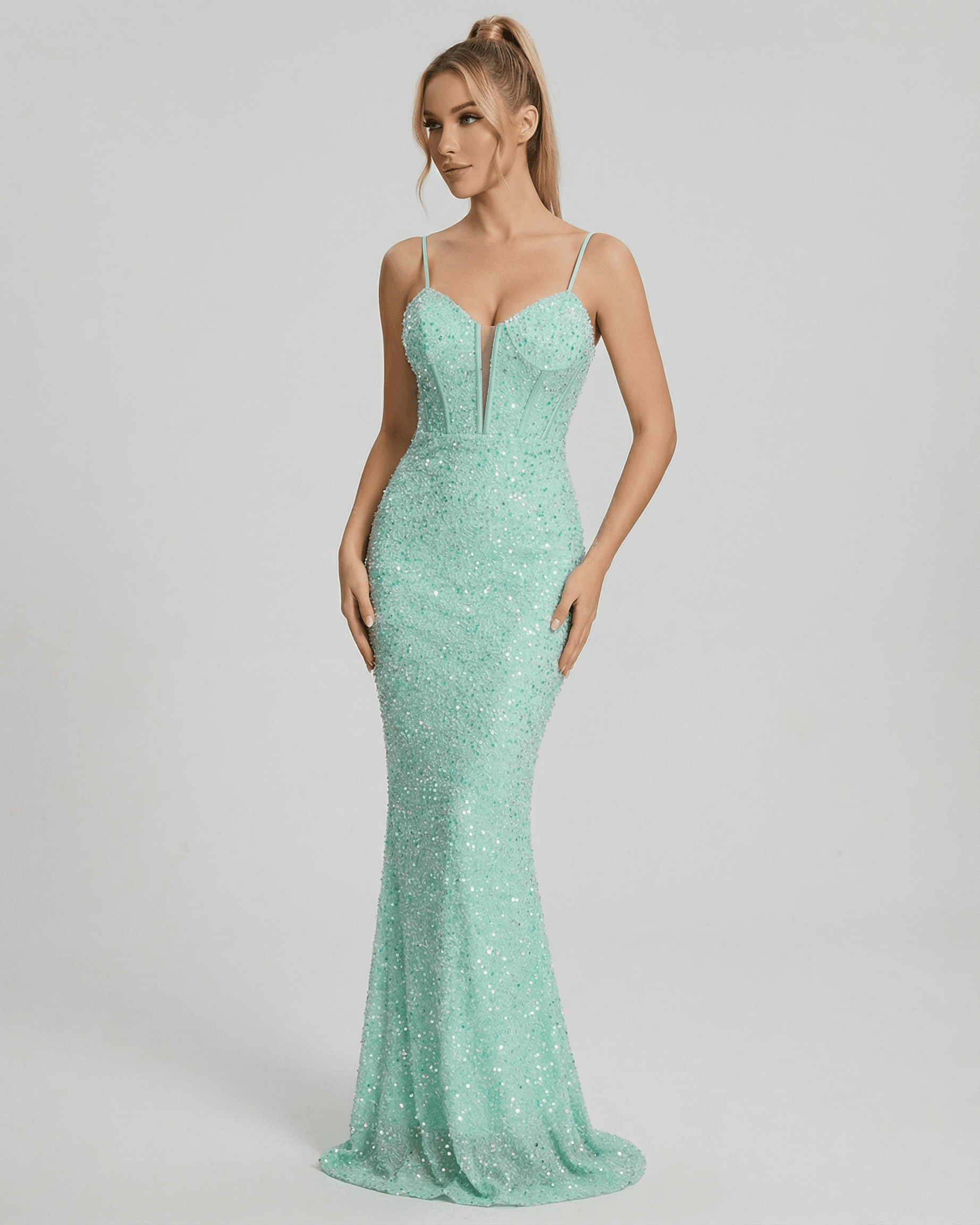 Celeste Maxi Dress by Lauven - Elegant green sequin fitted mermaid gown with spaghetti straps and V neckline.