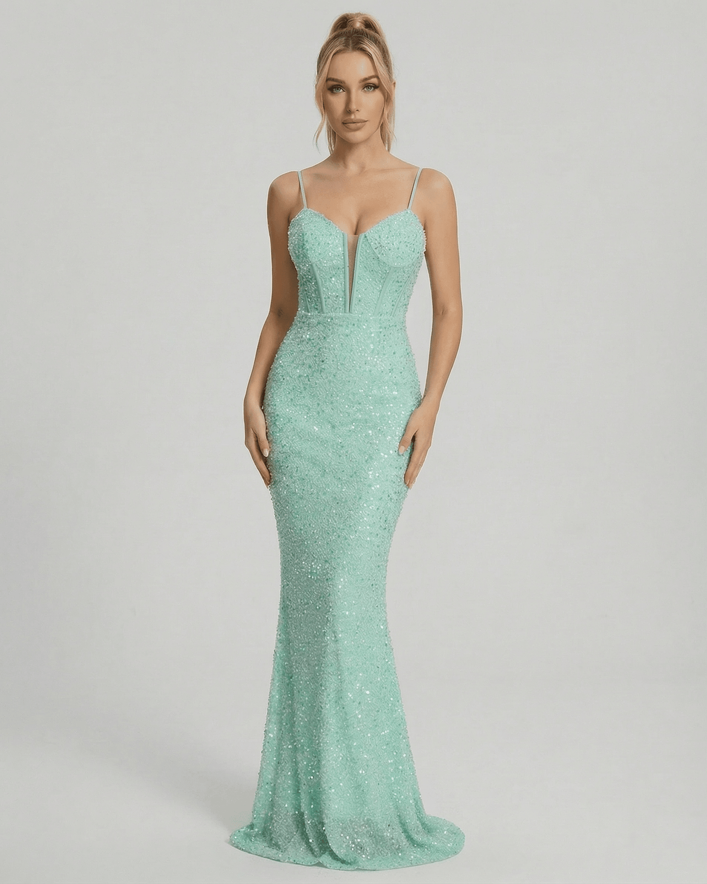 Celeste Maxi Dress by Lauven in shimmering green with sequin embellishment and mermaid silhouette.