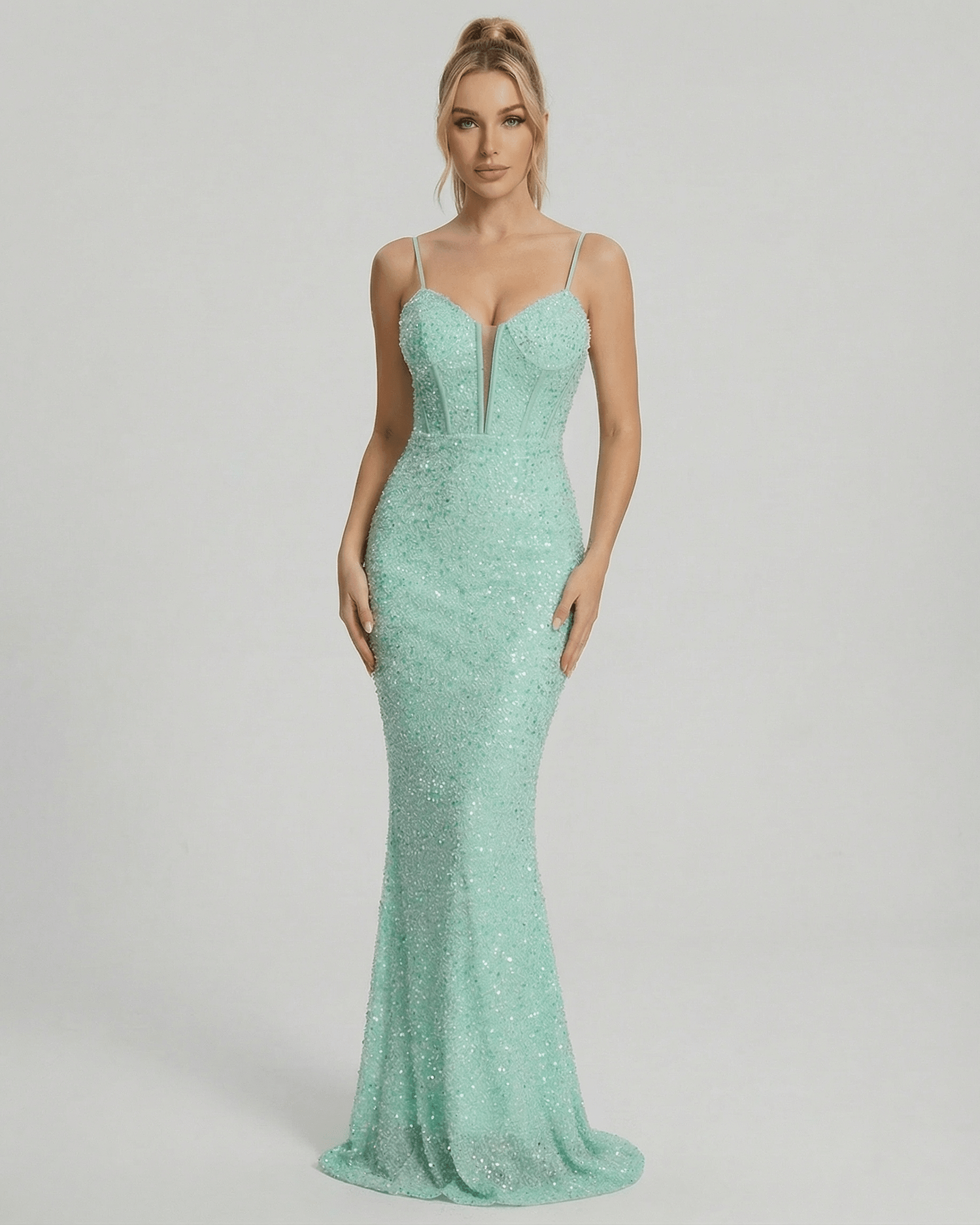 Celeste Maxi Dress by Lauven in shimmering green with sequin embellishment and mermaid silhouette.