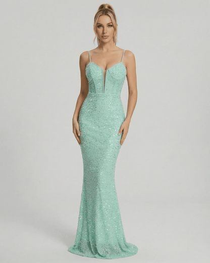 Celeste Maxi Dress by Lauven in shimmering green with sequin embellishment and mermaid silhouette.