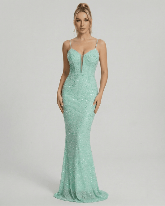 Celeste Maxi Dress by Lauven in shimmering green with sequin embellishment and mermaid silhouette.