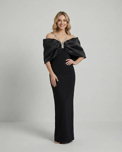 Lauven Celeste Maxi Dress featuring dramatic bow and elegant silhouette in black fabric.