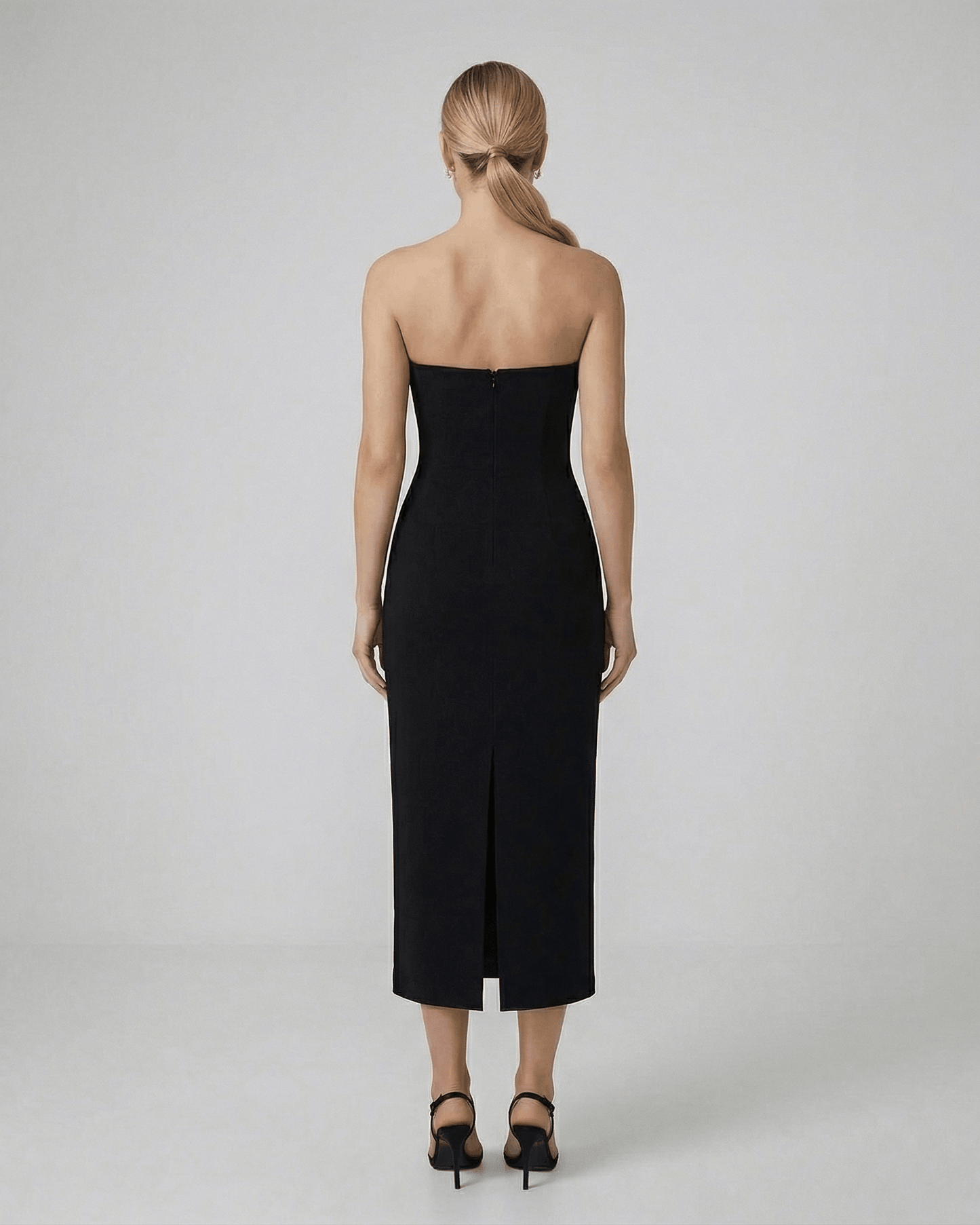Celeste Midi Dress by Lauven, showcasing a sleek silhouette and elegant back design for timeless evening wear.