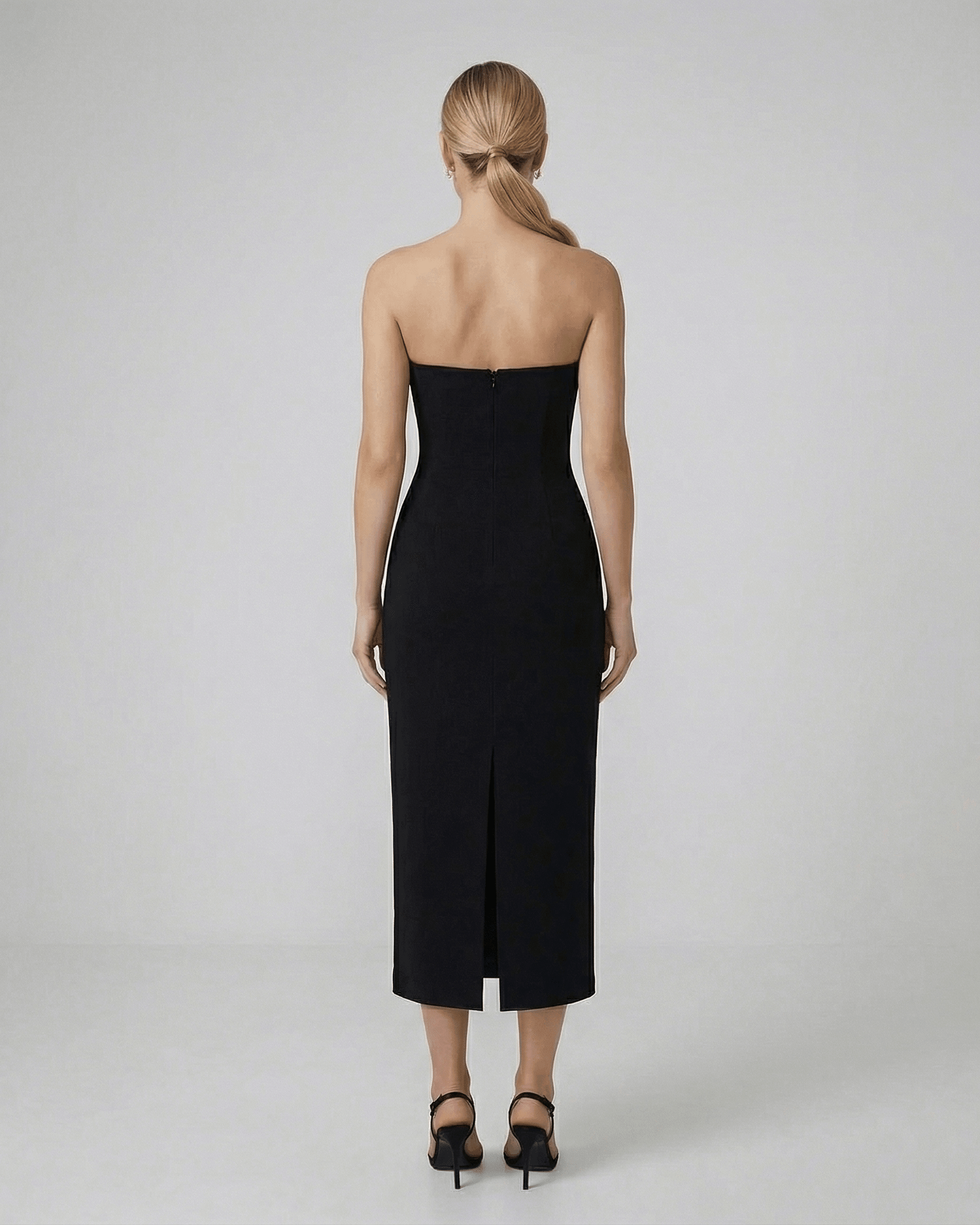 Celeste Midi Dress by Lauven, showcasing a sleek silhouette and elegant back design for timeless evening wear.