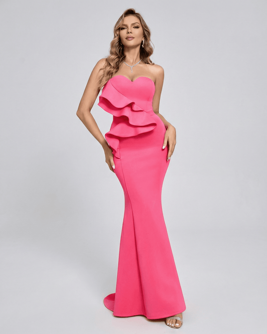 Celeste Maxi Dress by Lauven, vibrant pink strapless dress with elegant ruffle detail and trumpet silhouette.
