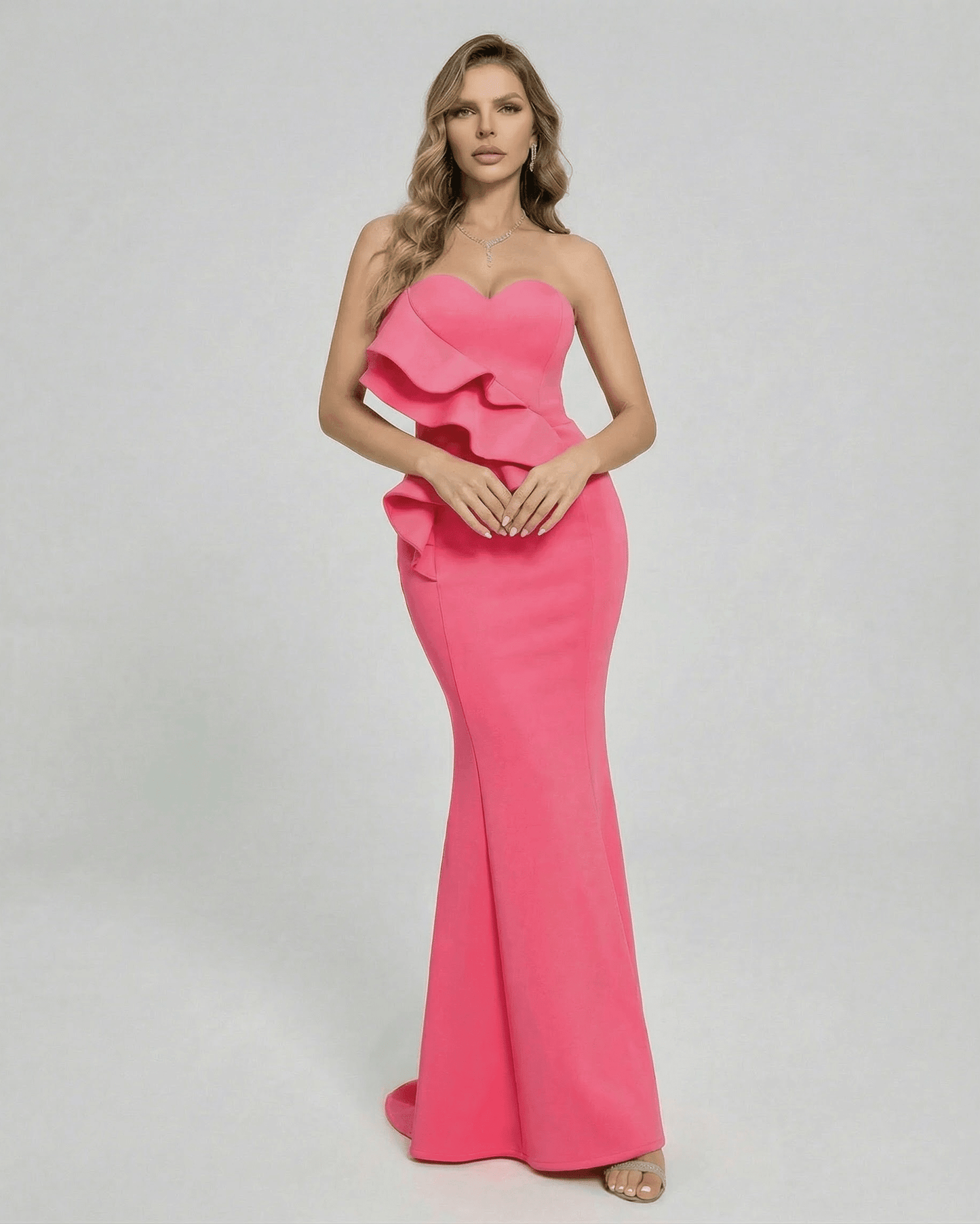 Celeste Maxi Dress by Lauven featuring elegant ruffle detail in vibrant pink, perfect for special occasions.